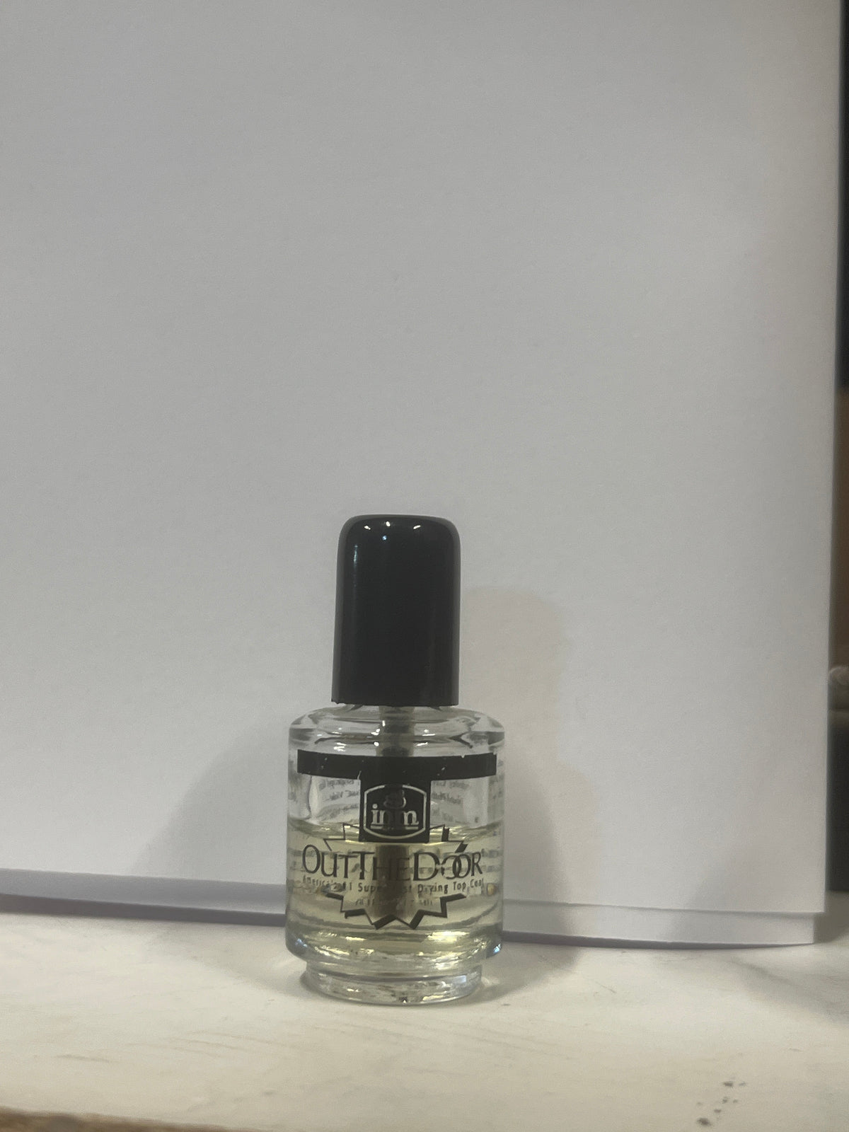 INM Out The Door Top Coat Mini flesje